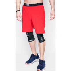 Under Armour - Szorty. Szare spodenki sportowe męskie Under Armour, z dzianiny, sportowe. W wyprzedaży za 179,90 zł.