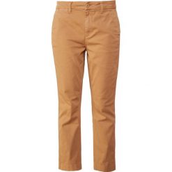 J.CREW Spodnie materiałowe honey brown. Pomarańczowe spodnie damskie marki J.CREW, bez wzorów, z elastanu. Za 419,00 zł.