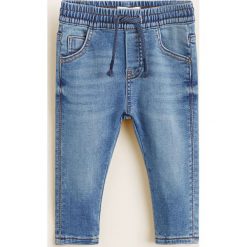 Mango Kids - Jeansy dziecięce Domfy 80-104 cm. Niebieskie spodnie chłopięce marki Mango Kids, bez wzorów, z elastanu. Za 69,90 zł.