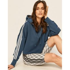 Adidas Originals - Bluza. Szare bluzy damskie adidas Originals, bez wzorów, z bawełny, bez rękawów, z kapturem. W wyprzedaży za 169,90 zł.