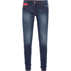 Bryczesy damskie: Dynafit Spodnie materiałowe dark denim