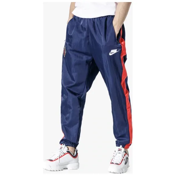 Nike Spodnie M Nsw Nsp Pant Wvn , granatowy, rozmiar M. Niebieskie spodnie męskie Nike, m, bez wzorów, z nylonu, eleganckie. W wyprzedaży za 199,99 zł.