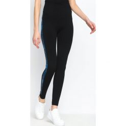 Niebieskie Legginsy Gold Gym. Niebieskie legginsy sportowe damskie marki Born2be, l. Za 9,99 zł.