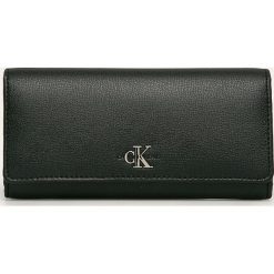 Calvin Klein Jeans - Portfel. Żółte portfele damskie Calvin Klein Jeans, bez wzorów, z jeansu. Za 299,90 zł.