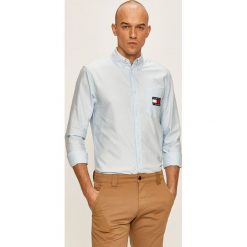 Tommy Jeans - Koszula DM0DM07895. Niebieskie koszule męskie Tommy Jeans, s, bez wzorów, z bawełny, casualowe, button down, z długim rękawem. W wyprzedaży za 359,90 zł.