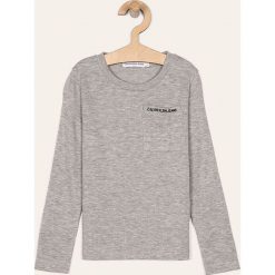 Calvin Klein Jeans - Longsleeve dziecięcy 104-176 cm. Niebieskie t-shirty chłopięce Calvin Klein Jeans, bez wzorów, z bawełny, z długim rękawem. W wyprzedaży za 139,90 zł.