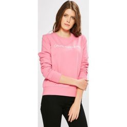 Calvin Klein Jeans - Bluza. Pomarańczowe bluzy damskie z nadrukiem marki Calvin Klein Jeans, s, z bawełny, bez kaptura. W wyprzedaży za 269,90 zł.