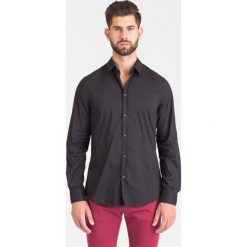 CZARNA KOSZULA TRUSSARDI JEANS. Czarne koszule męskie Trussardi Jeans, m, bez wzorów, z jeansu, z klasycznym kołnierzykiem, bez rękawów. Za 159,50 zł.