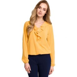 JULITA Bluzka z żabotem - żółta. Żółte bluzki damskie Stylove, s, bez wzorów, z elastanu, eleganckie, bez kołnierzyka, z długim rękawem. Za 119,00 zł.