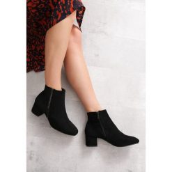 Czarne Botki Caldera. Czarne botki damskie Born2be, ze skóry, na niskim obcasie, na obcasie, na zamek. Za 159,99 zł.