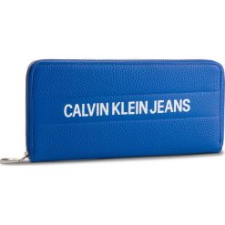 Duży Portfel Damski CALVIN KLEIN JEANS - Logo Banner Large Ziparound K40K400840 455. Niebieskie portfele damskie Calvin Klein Jeans, bez wzorów, z jeansu. W wyprzedaży za 229,00 zł.