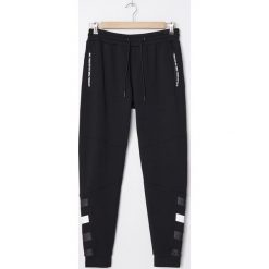 Joggery z nadrukiem -. Spodnie męskie House, s, z nadrukiem. Za 119,99 zł.