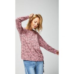 Bluzka oversize z nadrukiem. Bluzki damskie Moodo, s, z nadrukiem, bez kołnierzyka, bez rękawów. Za 34,99 zł.
