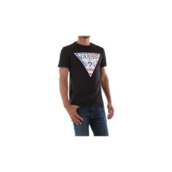 T-shirty z krótkim rękawem Guess M93I21 J1300. Czarne koszulki męskie Guess, s, z aplikacjami, bez kołnierzyka, krótkie. Za 138,45 zł.