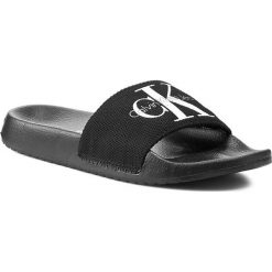 Klapki CALVIN KLEIN JEANS - Chantal RE9587 Black. Czarne klapki damskie marki Calvin Klein Jeans, w paski, z jeansu, bez obcasa. W wyprzedaży za 199,00 zł.