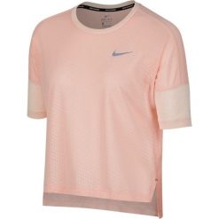 Koszulka Nike Tailwind Short-Sleeve Top W Pudrowa. Topy damskie Nike, bez wzorów, z materiału, bez kołnierzyka. Za 99,99 zł.