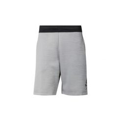 Szorty i Bermudy Reebok Sport Szorty Training Spacer. Szare spodenki i szorty męskie marki Reebok Sport, s, bez wzorów, sportowe, trekkingowe. Za 169,00 zł.