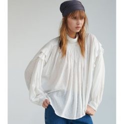 Bluzka oversize z zakładkami - Kremowy. Białe bluzki damskie Reserved, bez wzorów, bez kołnierzyka, bez rękawów. Za 119,99 zł.