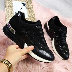 Buty sportowe damskie z cekinami czarne Sergio Leone. Czarne buty sportowe damskie Sergio Leone, bez wzorów, sportowe. Za 129,99 zł.