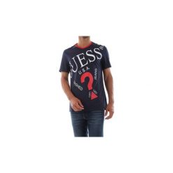 T-shirty z krótkim rękawem Guess M93I04 I3Z00. Niebieskie t-shirty męskie Guess, m, z aplikacjami, bez kołnierzyka, krótkie. Za 119,05 zł.