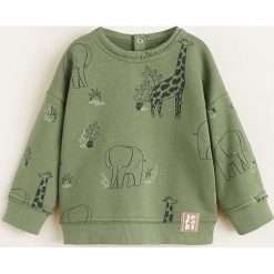 Mango Kids - Bluza dziecięca Tiger 80-104 cm. Żółte bluzy chłopięce Mango Kids, z nadrukiem, z bawełny, bez rękawów, bez kaptura. Za 59,90 zł.