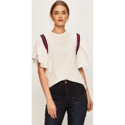Lee - T-shirt. Białe bluzki damskie Lee, s, z aplikacjami, z bawełny, z okrągłym kołnierzem. W wyprzedaży za 99,90 zł.