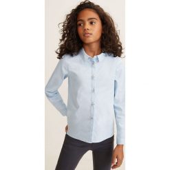 Mango Kids - Koszula dziecięca Placket 110-164 cm. Niebieskie bluzki dziewczęce Mango Kids, bez wzorów, z bawełny, z klasycznym kołnierzykiem, z długim rękawem, długie, bez kaptura. W wyprzedaży za 59,90 zł.