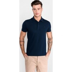 Lacoste Polo Koszulka Niebieski. Niebieskie podkoszulki męskie Lacoste, xxl, bez wzorów, z elastanu, bez rękawów. Za 481,95 zł.
