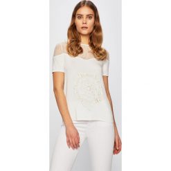 Desigual - Top. Czarne bluzki damskie Desigual, s, z nadrukiem, z elastanu, z okrągłym kołnierzem. W wyprzedaży za 139,90 zł.