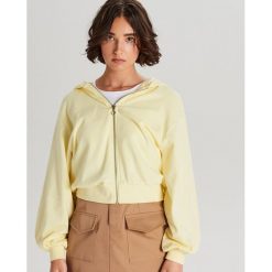 Rozpinana bluza z szerokimi rękawami - Żółty. Żółte bluzy damskie Cropp, s, bez wzorów, bez rękawów, bez kaptura. Za 79,99 zł.