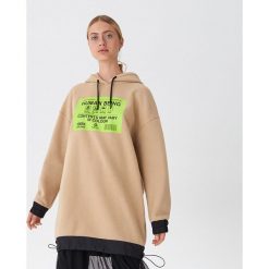 Długa bluza oversize - Beżowy. Brązowe bluzy damskie House, s, bez wzorów, z długim rękawem, długie, bez kaptura. Za 119,99 zł.