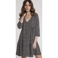 Czarna Sukienka Melloly. Czarne sukienki damskie Renee, s, bez wzorów, bez kołnierzyka, bez rękawów, mini. Za 99,99 zł.