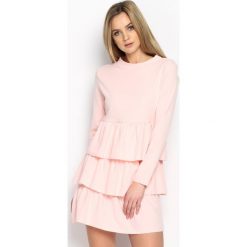 Jasnoróżowa Sukienka Modesty And Chic. Czerwone sukienki Born2be, na lato, s, mini. Za 69,99 zł.