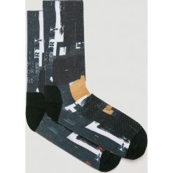Reebok - Skarpety Crossfit. Czarne skarpetki męskie Reebok, bez wzorów, z elastanu. W wyprzedaży za 49,90 zł.