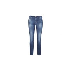 Jeansy slim fit Diesel BABHILA. Niebieskie jeansy damskie Diesel, bez wzorów, z jeansu. Za 567,20 zł.