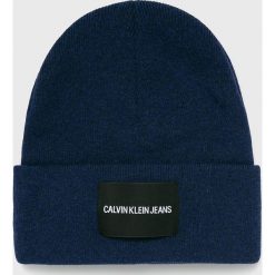 Calvin Klein Jeans - Czapka. Niebieskie czapki męskie Calvin Klein Jeans, na zimę, bez wzorów, z wiskozy. W wyprzedaży za 149,90 zł.