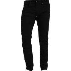 Cristiano Ronaldo CR7 Jeansy Slim fit onyx. Czarne jeansy męskie marki Cristiano Ronaldo CR7, z elastanu. W wyprzedaży za 303,20 zł.