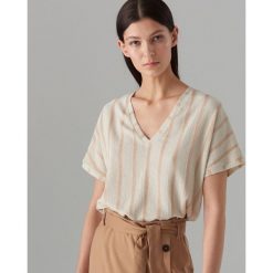 Bluzka oversize w paski - Kremowy. Białe bluzki damskie Mohito, s, w paski, bez kołnierzyka, bez rękawów. Za 69,99 zł.