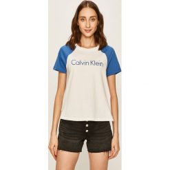 Calvin Klein Underwear - T-shirt. Białe bluzki damskie Calvin Klein Underwear, s, z nadrukiem, z bawełny, casualowe, z okrągłym kołnierzem, z krótkim rękawem. W wyprzedaży za 99,90 zł.