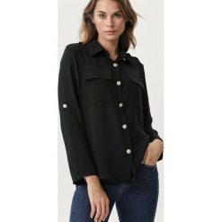 Czarna Koszula Tingara. Czarne bluzki damskie Born2be, m, bez wzorów, eleganckie, bez kołnierzyka, bez rękawów. Za 99,99 zł.