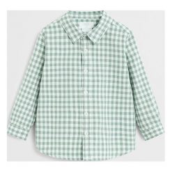 Mango Kids - Koszula dziecięca Simao 80-104 cm. Żółte koszule chłopięce Mango Kids, bez wzorów, z bawełny, klasyczne, z klasycznym kołnierzykiem, z długim rękawem, długie. W wyprzedaży za 47,90 zł.