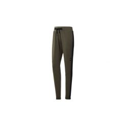 Spodnie treningowe Reebok Sport Spodnie dresowe Training Supply Slim. Zielone spodnie dresowe damskie marki Reebok Sport, s, z dresówki. Za 269,00 zł.