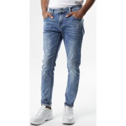 Niebieskie Jeansy Thorne. Niebieskie jeansy męskie Born2be, m, w paski. Za 119,99 zł.
