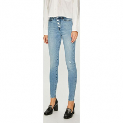 Guess Jeans - Jeansy 1981. Niebieskie jeansy damskie rurki Guess Jeans, z podwyższonym stanem. Za 459,90 zł.
