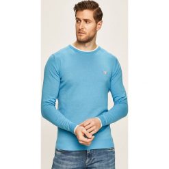 Guess Jeans - Sweter. Niebieskie swetry męskie Guess Jeans, s, z aplikacjami, z bawełny, z okrągłym kołnierzem, bez kaptura. Za 329,90 zł.
