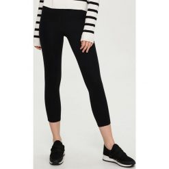 Bawełniane legginsy - Czarny. Białe legginsy marki Sinsay, l, z napisami. Za 19,99 zł.