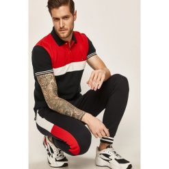 Tommy Hilfiger - Spodnie sportowe. Niebieskie spodnie męskie TOMMY HILFIGER, xl, bez wzorów, z bawełny, sportowe. Za 539,90 zł.