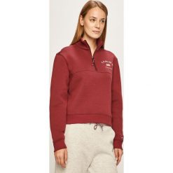 Tommy Jeans - Bluza. Niebieskie bluzy damskie Tommy Jeans, s, z aplikacjami, z bawełny, z krótkim rękawem, krótkie, bez kaptura. W wyprzedaży za 269,90 zł.
