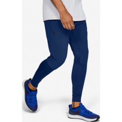 Under Armour Hybrid Spodnie dresowe Niebieski. Niebieskie spodnie męskie Under Armour, s, bez wzorów, z elastanu. Za 326,95 zł.
