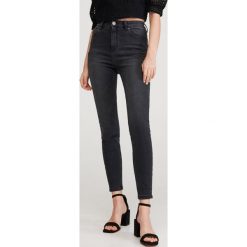 Jeansy slim z bawełny organicznej - Czarny. Czarne jeansy damskie Reserved, bez wzorów, z bawełny. Za 79,99 zł.
